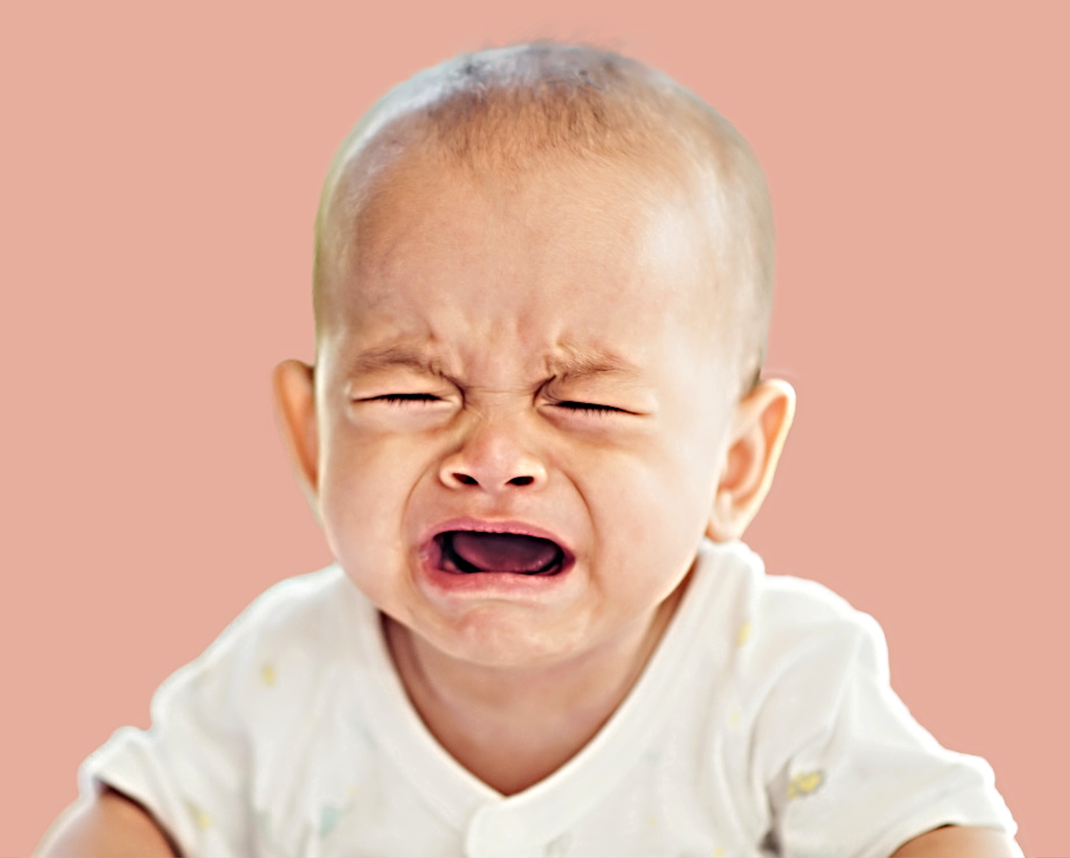 Baby boy crying. Sad child portrait